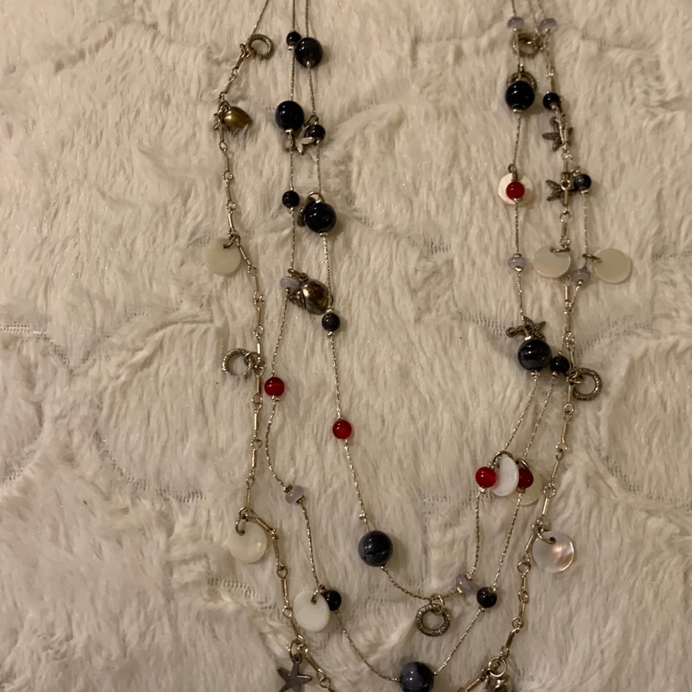 Silver,red and darkβ grey beads,small white circle .